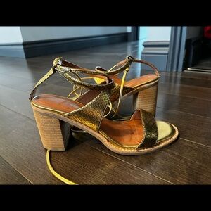 Jeffrey Campbell x Free People gold tie up heeled sandals.
